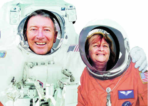 LOST IN SPACE: Peter Carey and Bridget Edwards pose as astronauts at the Kennedy Space Centre. LOST IN SPACE: Peter Carey and Bridget Edwards pose as astronauts at the Kennedy Space Centre.